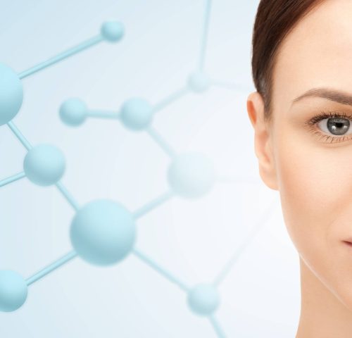 beauty, people and health concept - beautiful young woman face over blue background with molecules